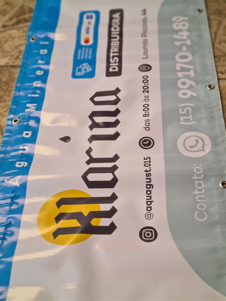 Lona brilho com ilhós para fachada de distribuidora de água